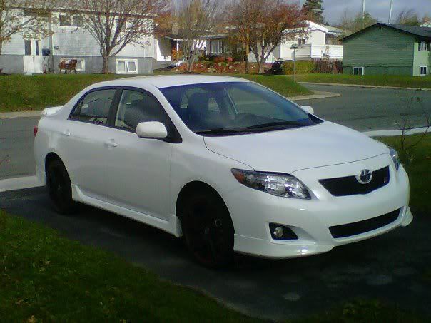 2010 toyota corolla black rims #1