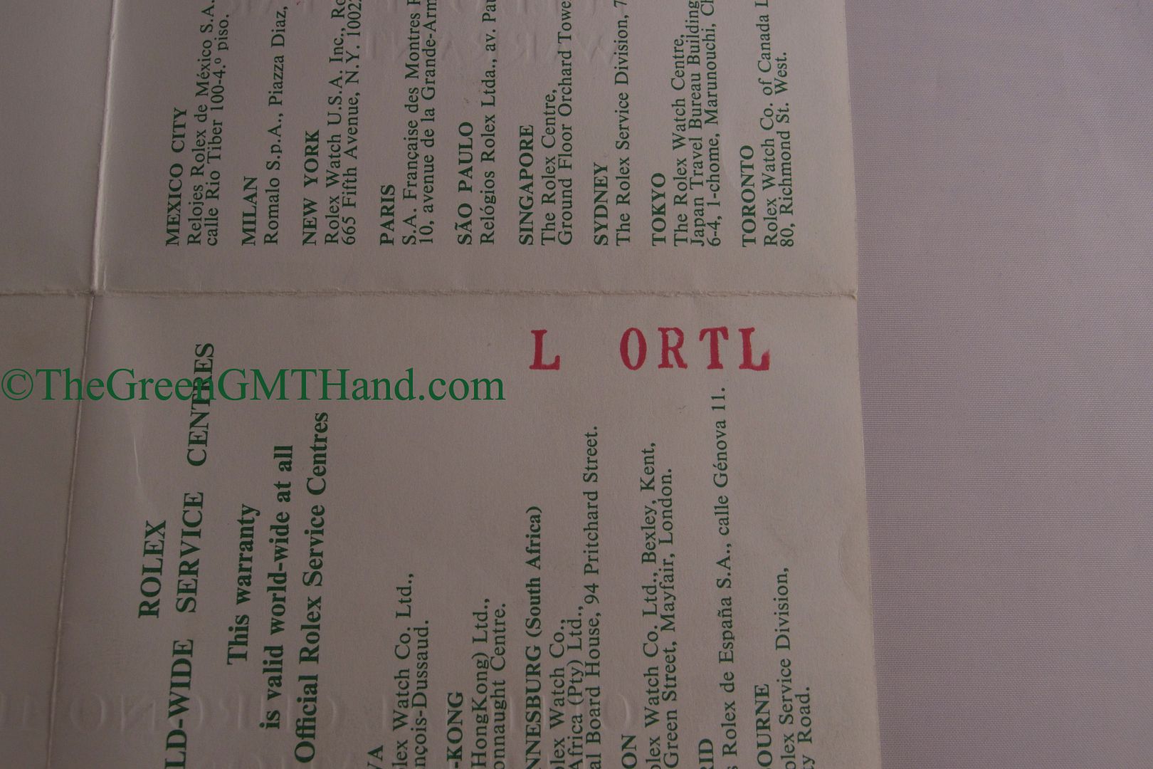  Example of Rolex red letters printed on back of warranty certificate
