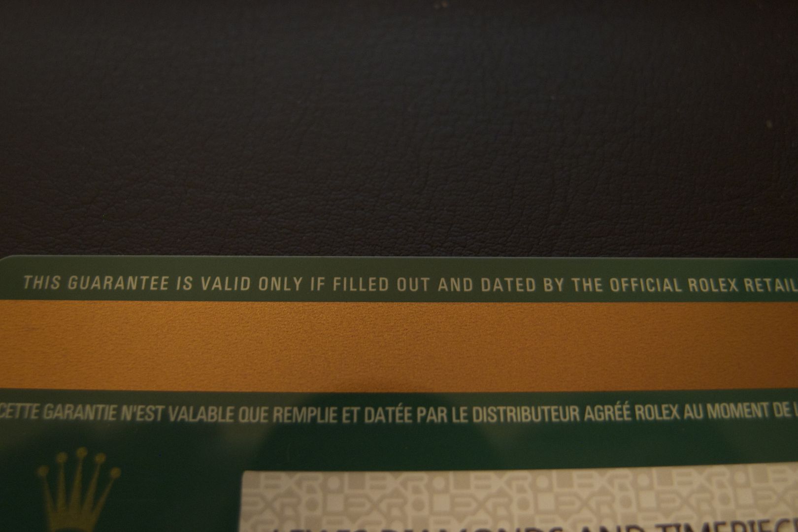 Closer look at the magnetic strip on new updated Rolex warranty card