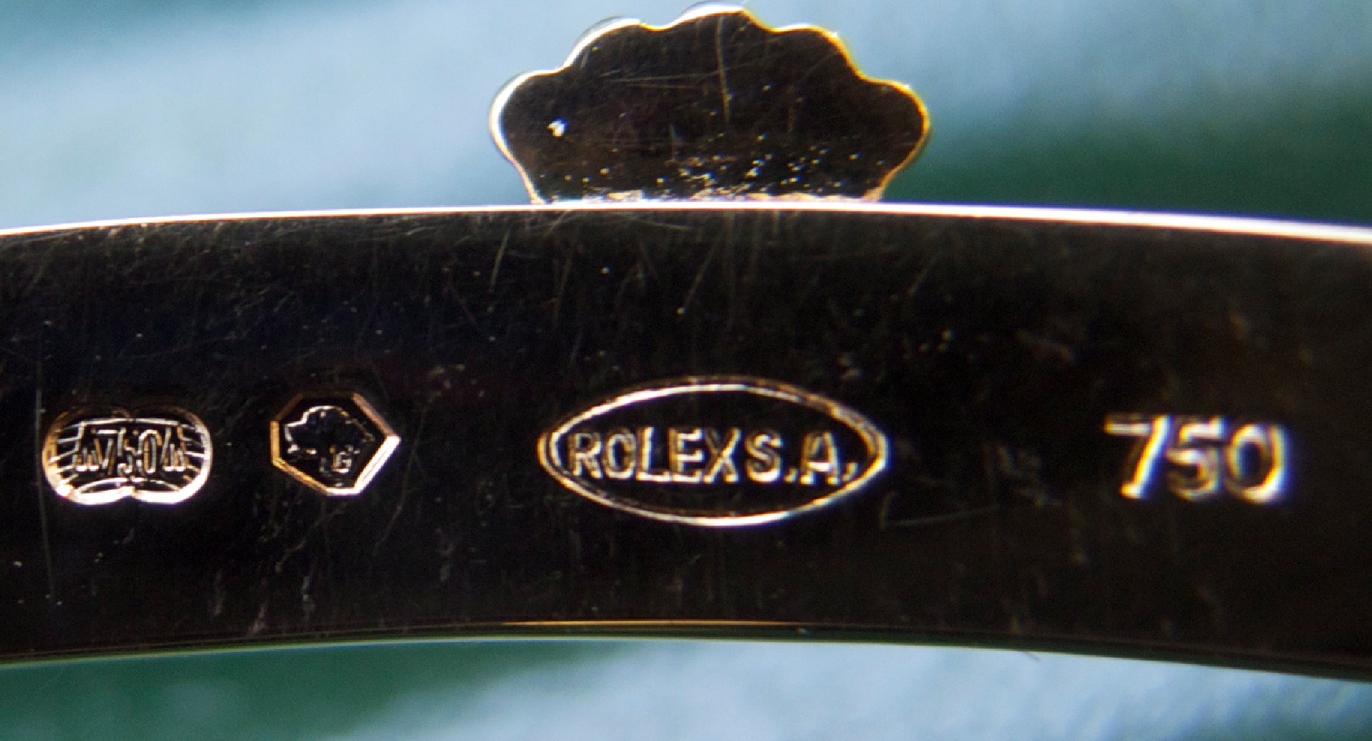  Closeup of Rolex 5330/8 Cellini buckle stamped with St. Bernard dog