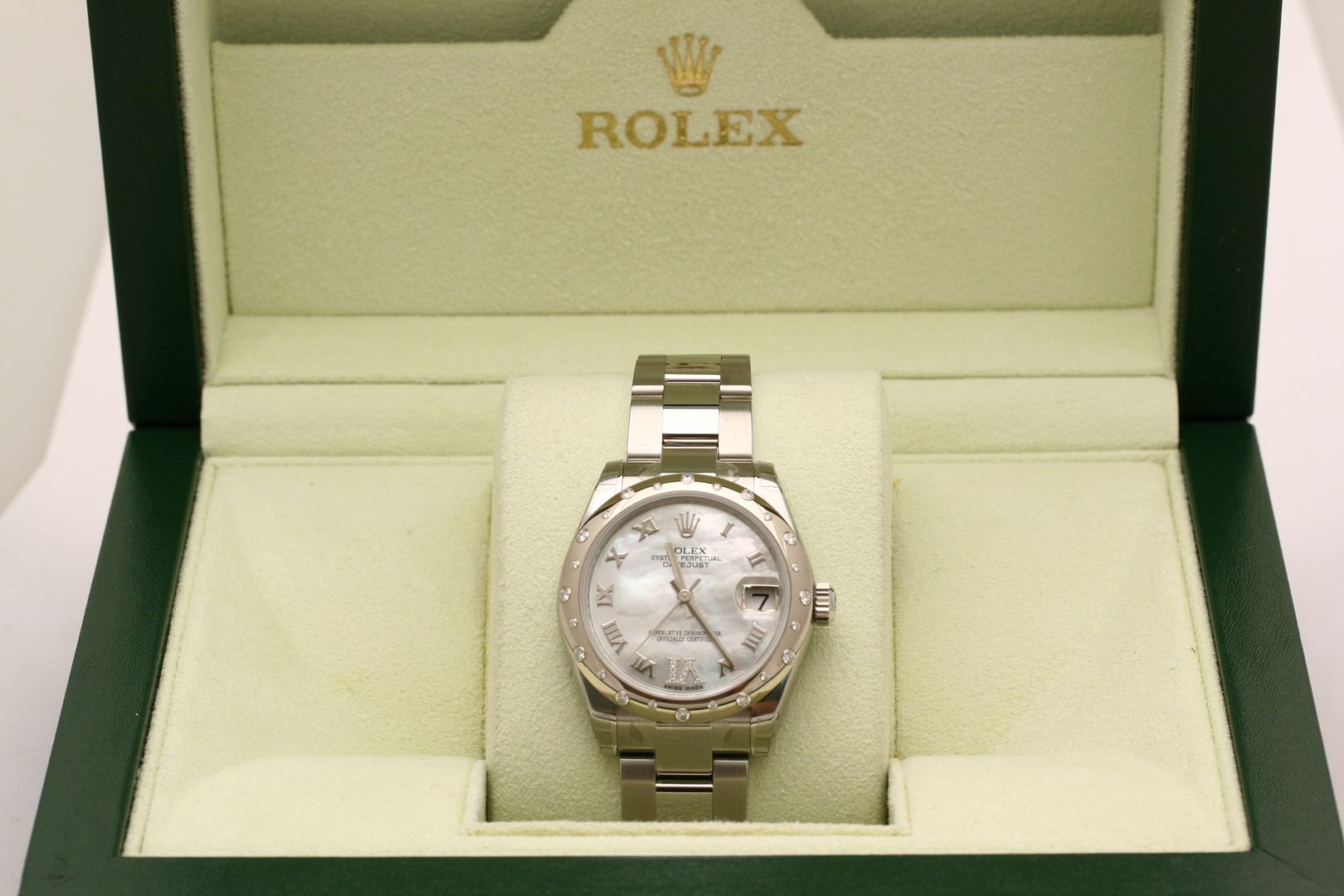 Inside view of Rolex green wave box set
